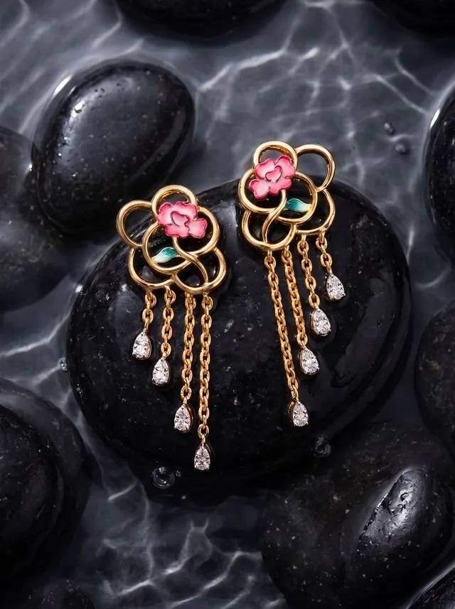 Elegant drop earrings in 925 gold-plated silver, featuring flowing circular silhouettes accented with champlevé enamel roses and Swarovski crystals for a refined sparkle.