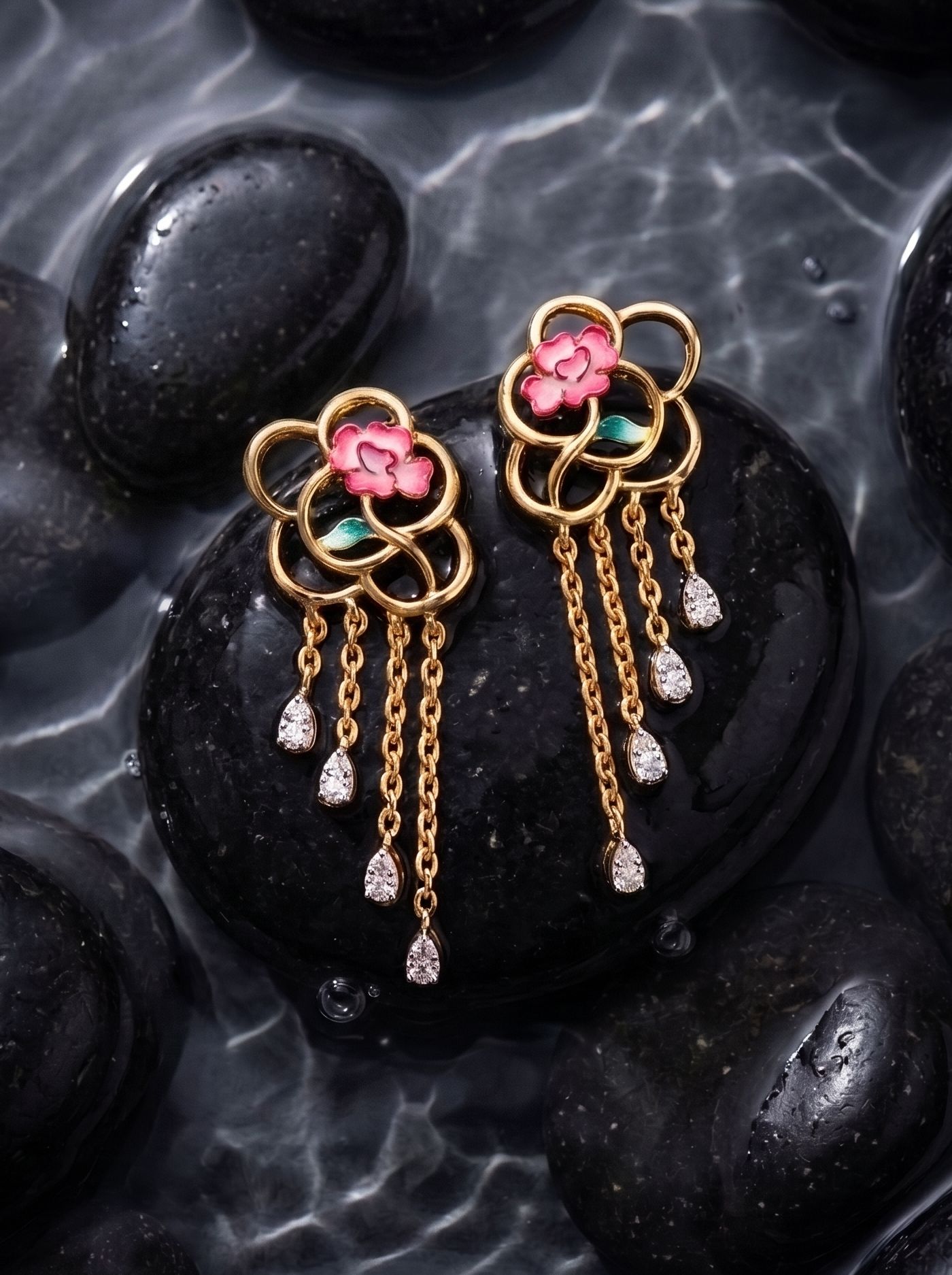 Elegant drop earrings in 925 gold-plated silver, featuring flowing circular silhouettes accented with champlevé enamel roses and Swarovski crystals for a refined sparkle.